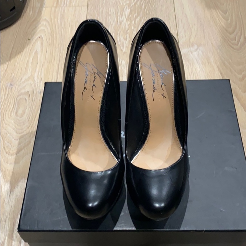Black wedge w Silver trim at heel.